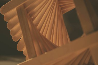 close up shot of a row of wood sticks