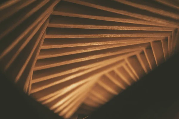 close up shot of a row of wood sticks