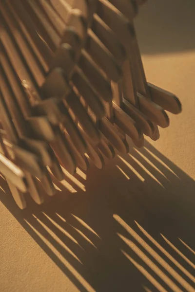 close up shot of a row of wood sticks