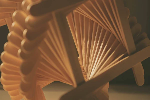 close up shot of a row of wood sticks