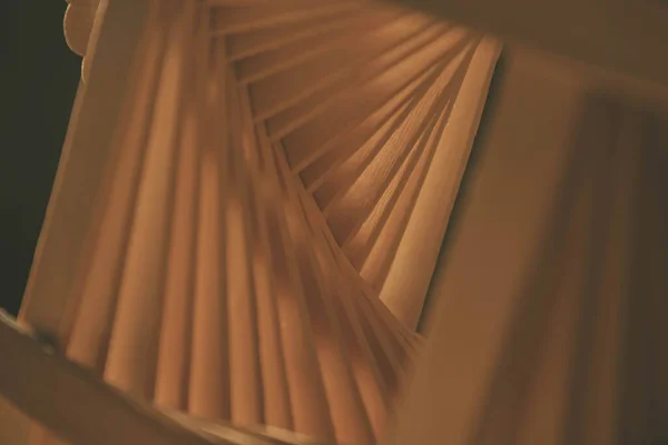 close up shot of a row of wood sticks