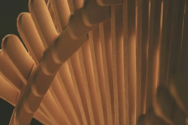 close up shot of a row of wood sticks