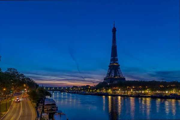 Blue Hour at Morning Over Eiffel Tower Seine River in Paris With Traffic