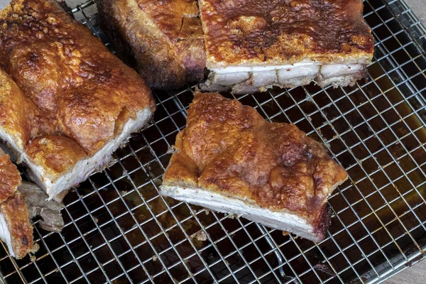 Crispy Pork Belly or roasted pork meat. Siu yuk, sho ru;  su yuhk;  is a variety of siu mei, or roasted meat dishes, in Cantonese cuisine. It is made by roasting an entire pig with seasonings.