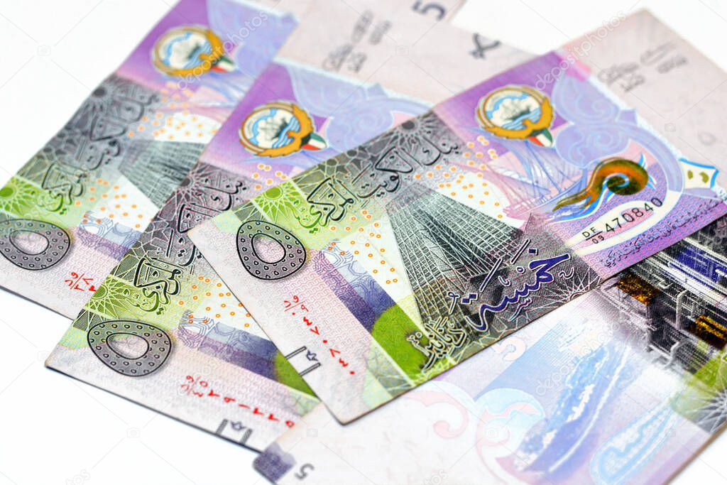Five Kuwaiti dinars bill banknote 5 KWD features The new headquarters of the Central Bank of Kuwait and oil refinery and an oil tanker, Kuwaiti dinar is the currency of the State of Kuwait isolated