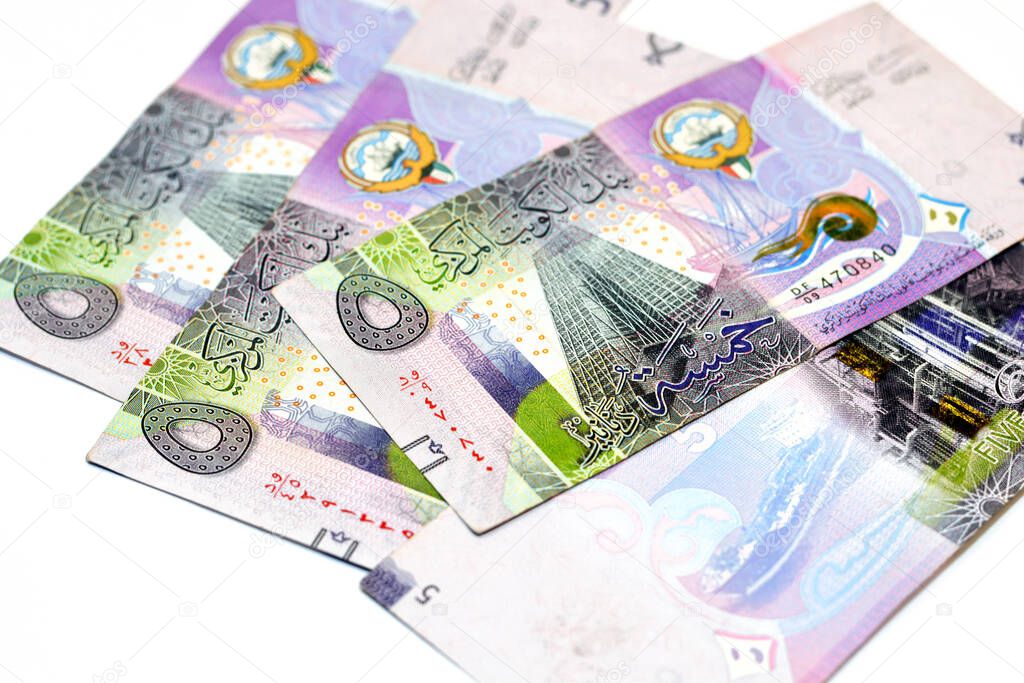 Five Kuwaiti dinars bill banknote 5 KWD features The new headquarters of the Central Bank of Kuwait and oil refinery and an oil tanker, Kuwaiti dinar is the currency of the State of Kuwait isolated