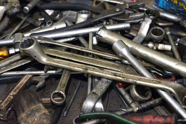 Cairo, Egypt, March 5 2022: Set of mechanical tools at the mechanic workshop, Car repair equipment, tool set for car maintenance, ring spanners, wrenches, repair instruments, selective focus