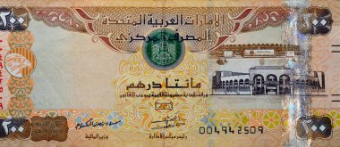 Zayed Spor Şehri Stadyumu ve Şeriat Mahkemesi binası, Emirlik para banknotunun yer aldığı Birleşik Arap Emirlikleri 'nin 200 Dirhem banknotunun ters tarafının büyük bir parçası.