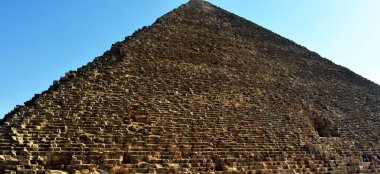 Giza, Egypt, May 1 2016: The great pyramid of Giza which is the largest Egyptian pyramid and tomb of Fourth Dynasty pharaoh Khufu, it is the oldest of the seven wonders of the ancient world