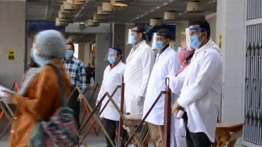 Cairo, Egypt, March 6 2021: Footage of strict precautionary measures before a university building entry, face masks and temperature checking amid covid-19 coronavirus global crisis epidemic outbreak