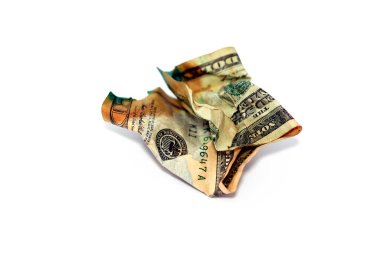 Crumpled American money note of 20 $ twenty dollars bill isolated on white background, wrinkled American dollar cash bill banknote, economy inflation and world money crisis concept, selective focus