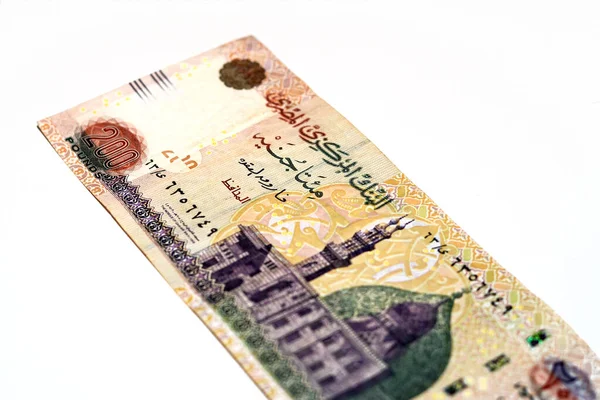 200 200エジプトポンド紙幣シリーズ2012の反対側には カイロエジプトのカニ湾モスク 白に隔離されたエジプト中央銀行によるエジプトの現金紙幣の選択的焦点があります — ストック写真