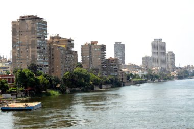 Cairo, Egypt, July 10 2022: The river Nile running through Cairo city, The Nile is a major north-flowing river in northeastern Africa that flows into the Mediterranean sea, selective focus