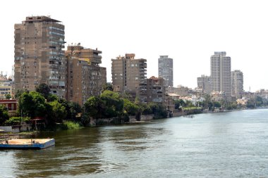 Cairo, Egypt, July 10 2022: The river Nile running through Cairo city, The Nile is a major north-flowing river in northeastern Africa that flows into the Mediterranean sea, selective focus