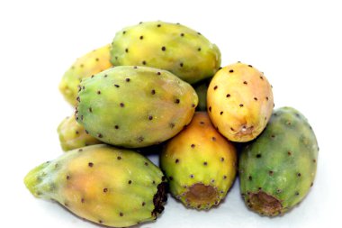 Pile of fresh prickly pear fruit isolated on white background, selective focus, Opuntia, commonly called prickly pear, Barbary fig, tuna fruit, sabra and nopal