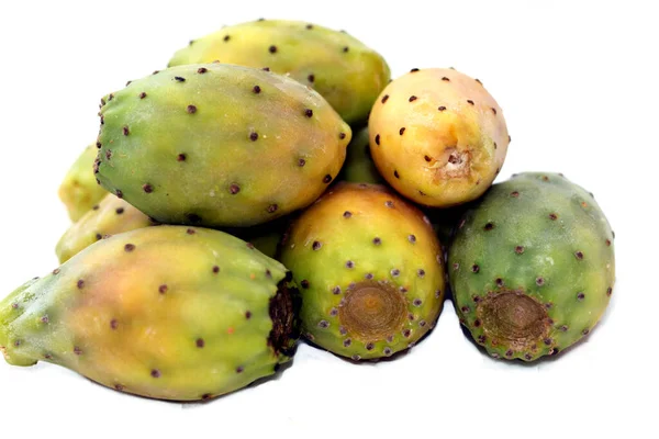 Pile of fresh prickly pear fruit isolated on white background, selective focus, Opuntia, commonly called prickly pear, Barbary fig, tuna fruit, sabra and nopal