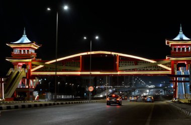 Cairo, Egypt, August 4 2022: Shinzo Abe axis patrol highway in Egypt at night with a pedestrian bridge finished in traditional Japanese architectural style named on former Japanese Prime minister