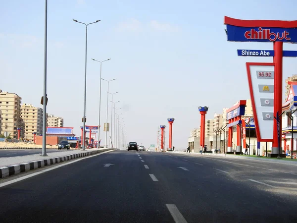 Cairo, Egypt, August 17 2022: Shinzo Abe axis patrol highway in Egypt, the traffic highway is named on former Japanese prime minister with chillout gas station in Jaspanese style, selective focus