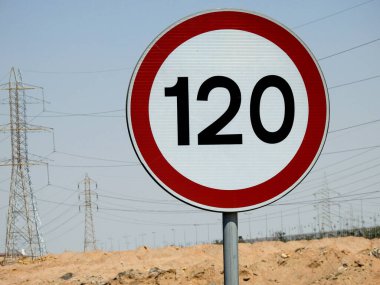 120 KM Speed limit sign in a free highway, one hundred twenty kilometers per hour traffic road sign, a restriction sign for car drivers not to exceed the set speed of the highway