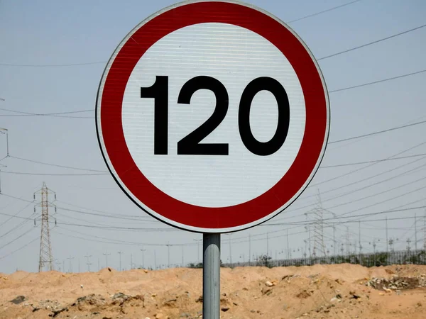 120 KM Speed limit sign in a free highway, one hundred twenty kilometers per hour traffic road sign, a restriction sign for car drivers not to exceed the set speed of the highway