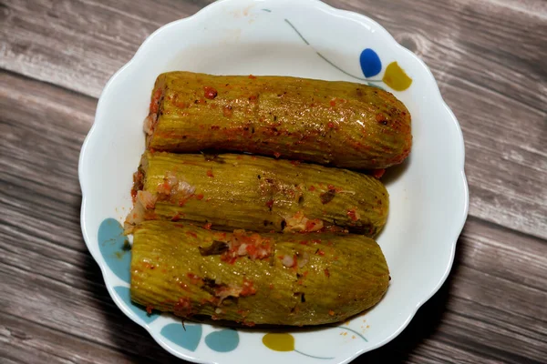 Stuffed squash, courgette, marrow, mahshi, or zucchini filled with white rice, onion, parsley, dill and coriander, selective focus of Arabic Egyptian traditional cuisine of Mahshy