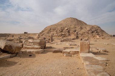 View to pyramid of Unas from archeological remain in the Saqqara necropolis, Egypt