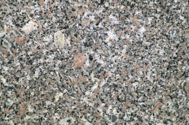 The photo shows gray and white granite. Can be used as background