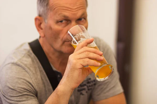 Caucasian Senior Man Gray Hair Gray Shirt Holding Drinking Glass —  Fotos de Stock