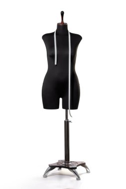 Tailor's mannequin on a metal stand on a white background with a shadow. Isolated