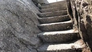 Stone stairs up, subjective camera.
