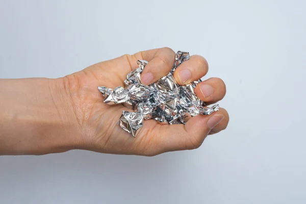 Hands Full Candies Silver Shells — Foto Stock