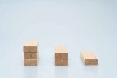 Expressing various concepts such as dominoes and business using wood jenga