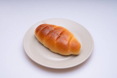 Sweet and tasty bread in a bowl