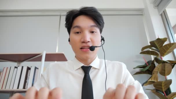 Young Asian Male Confident Support Service Representative Talking Web Camera — Stock Video