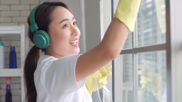 Slow Motion Young Happy Asian Woman Headphones Listening Music Washing — Stock Video