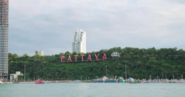 The famous Pattaya city sign on the hill at Bali Hai Pier in Chonburi. Pattaya is famous city for beaches, tourist destinations and nightlife.