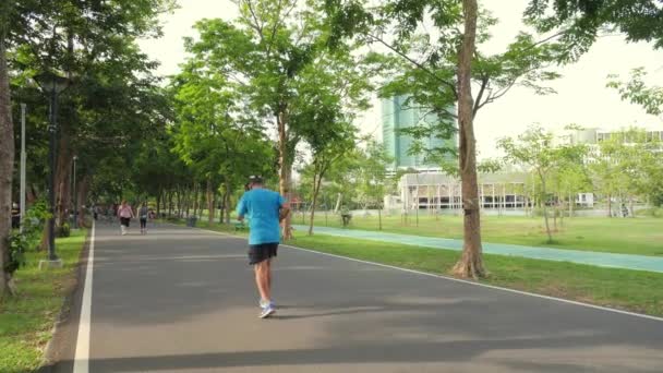 Gente Corriendo Parque Verde Público Tailandia Parque Salud Fitness Park — Vídeo de stock