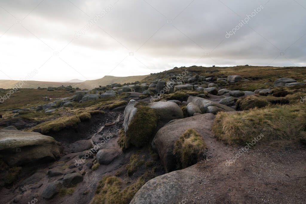 The Woolpacks rocks along the edge in the Kinder Scout National Nature Reserve, United Kingdom.