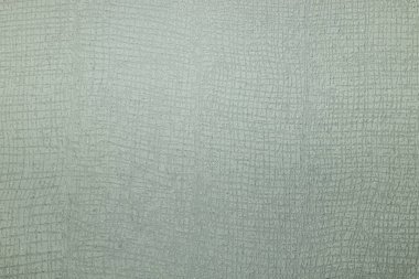 Geometrik desenli bej kumaş dokusu