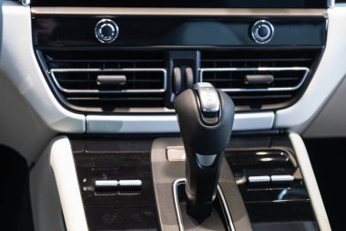 Modern expensive car interior and gearbox shift handle