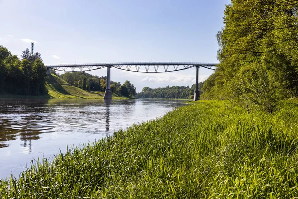 White Rose pedestrian bridge over the river of Nemunas. Alytus, Lithuania.