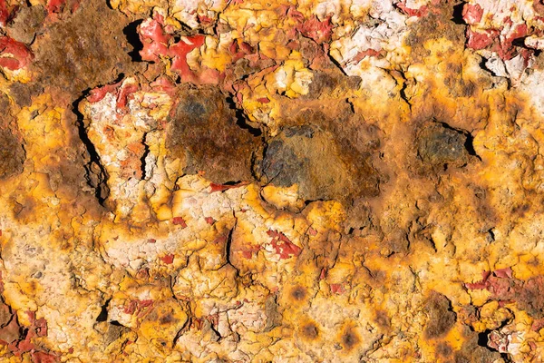 Corrosion and deep crack on the texture of the surface. Peeling paint texture.