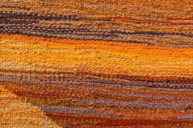 El yapımı dekoratif geometrik desenli eski halı dokusu.