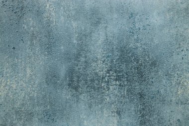 Denim Blue grunge dekoratif sıva desenli dağınık duvar yüzeyi.