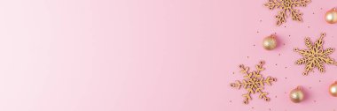 Pembe arka planda bej toplu Noel arkaplanı. Düz yat, boşluğu kopyala