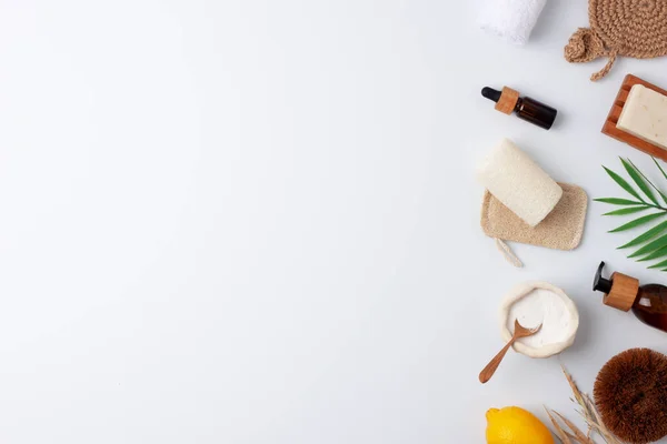 Zero waste, sustainable and eco-friendly lifestyle. Set of eco friendly natural cleaning products on white background. Flat lay, copy space.