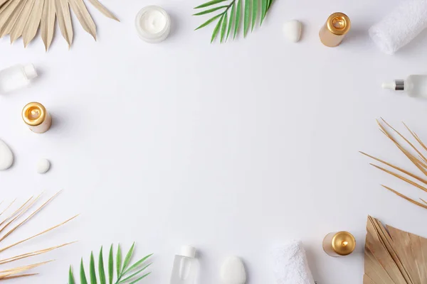 Spa Treatment Cosmetic Bottle Candles Palm Leaf White Background Flat — Stock Photo, Image