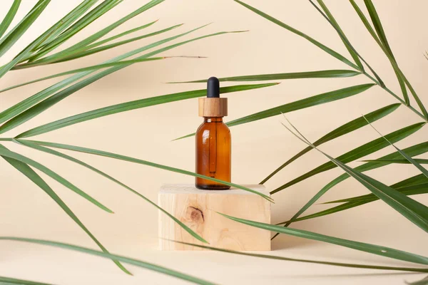 Cosmetic Bottle Wood Podium Palm Leaf Pastel Beige Background Close — Stock Photo, Image