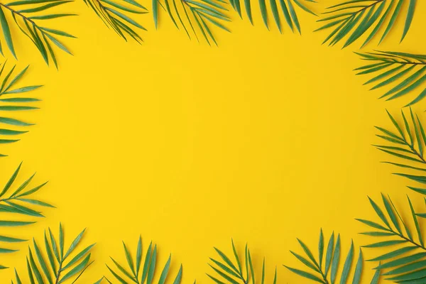 Yellow Background Palm Leaves Flat Lay Copy Space — Stock Photo, Image