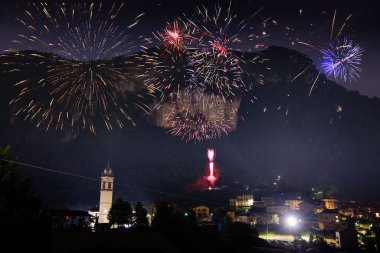 Fireworks with cornalba cliff in the background